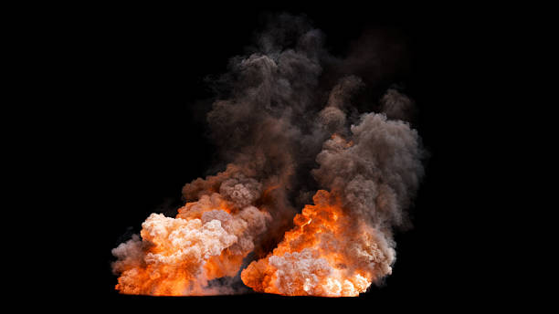 istock Two Isolated dramatic large explosions with intense billowing flames and thick grey smoke on black 2241137168