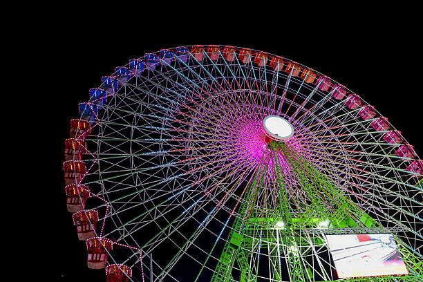 istock Colorful big Ferris Wheel at night 2241137989