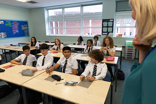 Teacher Giving Explanation to Students During Lesson