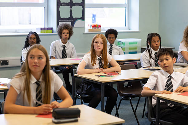 istock Students Listening Attentively in Class 2241138115