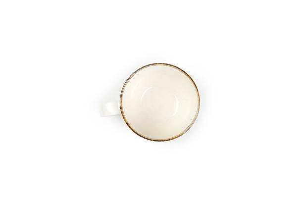 istock Top view, Beige ceramic coffee cup or tea with brown rim isolated on a white background. Use for home or restaurant. 2241139844