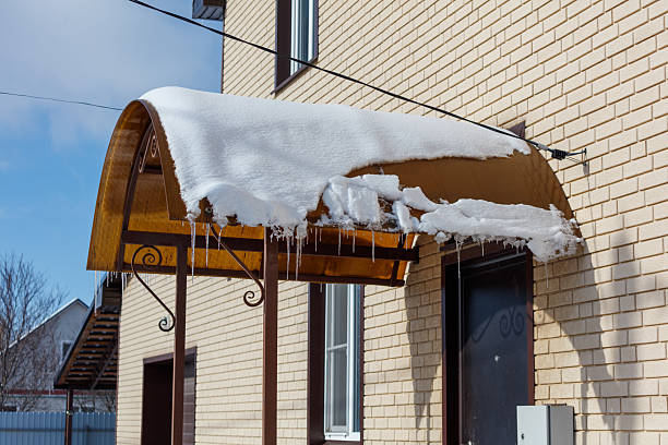 istock A brown awning with snow on it 2241145176