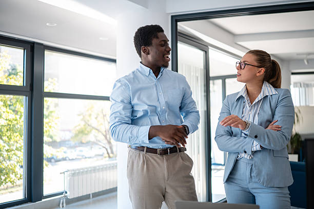 istock Professional business colleagues discussing ideas in modern office 2241146174