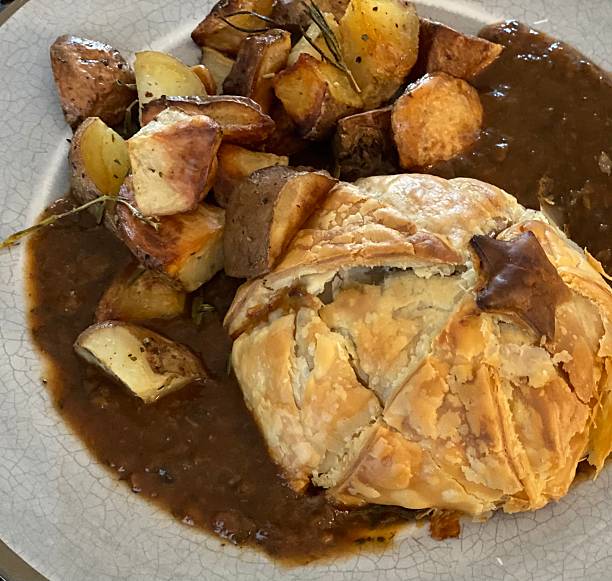 istock chestnut wellington with roasted potatoes - Christmas dinner 2241146504