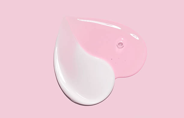 istock glossy cosmetic textures smooth stroke line cream products close-up on pink background moisturizing and skin care concept 2241146717