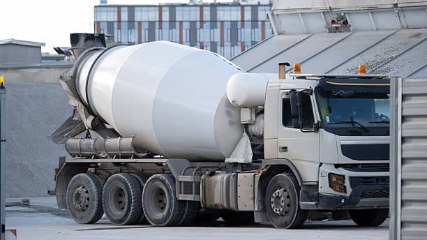 istock Concrete mixer truck at construction materials plant 2241146772