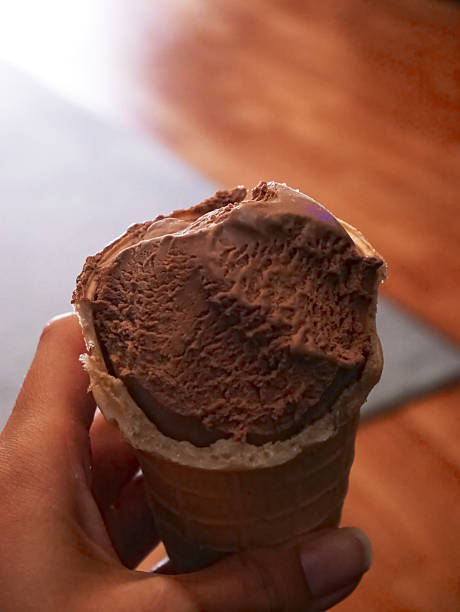 istock Delicious chocolate ice cream cone delight 2241148992