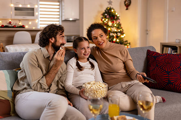 istock Family Watching TV on Christmas Evening 2241151222