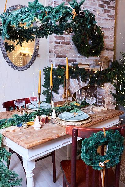 istock Decorations for New Year or Christmas. The festive table is set 2241154822