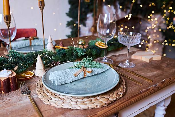 istock Decorations for New Year or Christmas. The festive table is set 2241155017