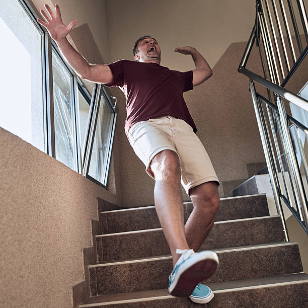 istock Man having an injury on the staircase. 2241160757