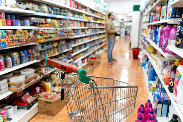 istock Man shopping in a grocery store aisle 2241161656