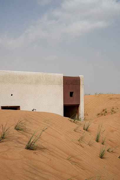 istock Half-Buried House under Desert Sky, Al Madam Ghost Town 2241162353