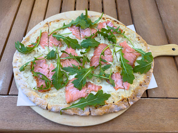 Flammkuchen or tarte flambee, flatbread with salmon