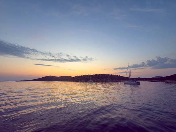 Serene Sunset Sailboat Anchorage