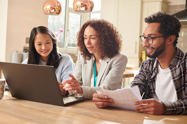istock financial adviser with couple 2241163518