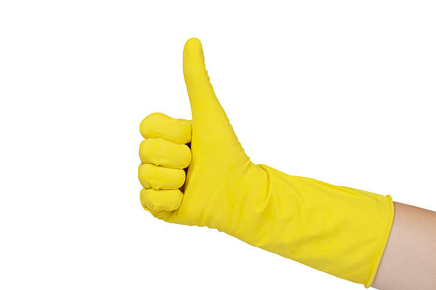 istock Hand Wearing Glove Shows Thumb Up Isolated 2241165130