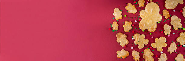 istock Christmas cookies background with various gingerbread man biscuits 2241167551