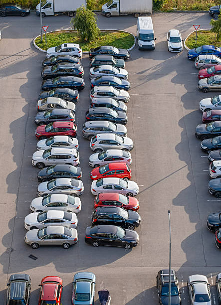 istock apartment building parking lot aerial view 2241171950