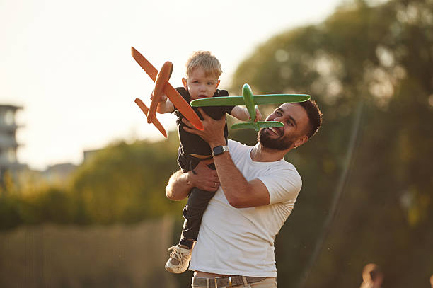 istock Happy father with son on the field 2241172099