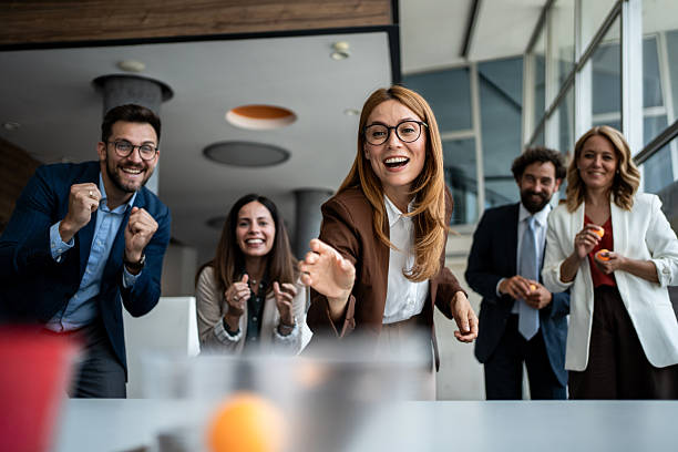 istock Business colleagues having fun playing game during office break 2241176972