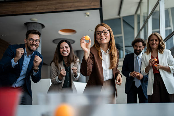 istock Happy business people enjoying fun team building activity 2241176976