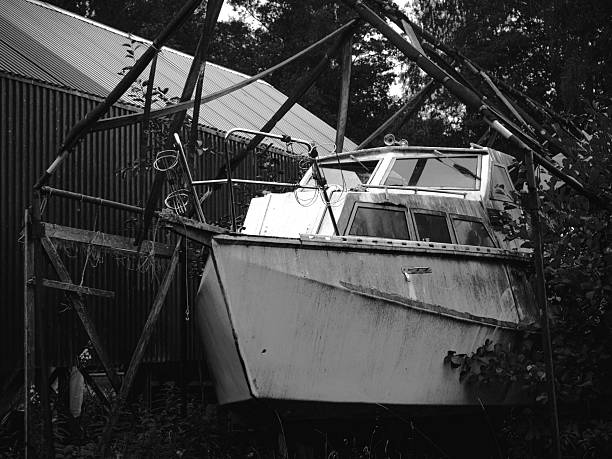 An old abandoned motorboat at a shelter