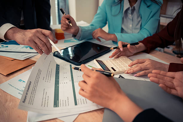 istock Data analysis meeting with business team using laptops and digital charts for strategic planning. With digital tablets and business graphs with data working in the office. 2241181766