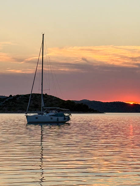 istock Sunset Sailboat Serenity 2241186137