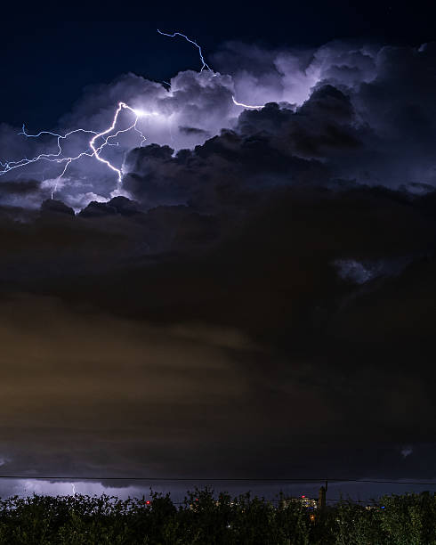istock Billowy cloud with lightning coming out of it 2241186510