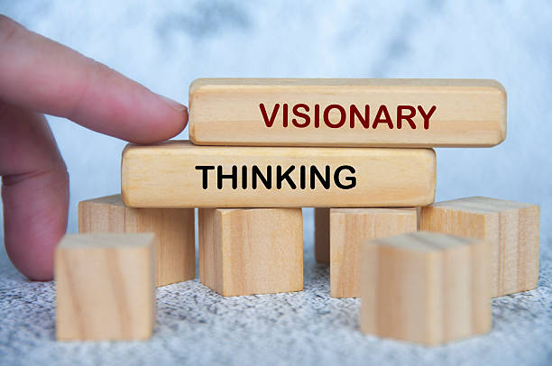 istock Wooden blocks showing VISIONARY THINKING text for creativity and innovation. 2241186914