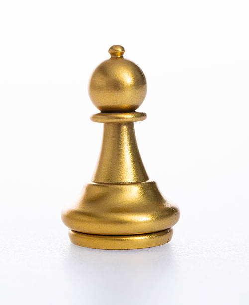 istock Golden pawn chess piece on white background 2241188658