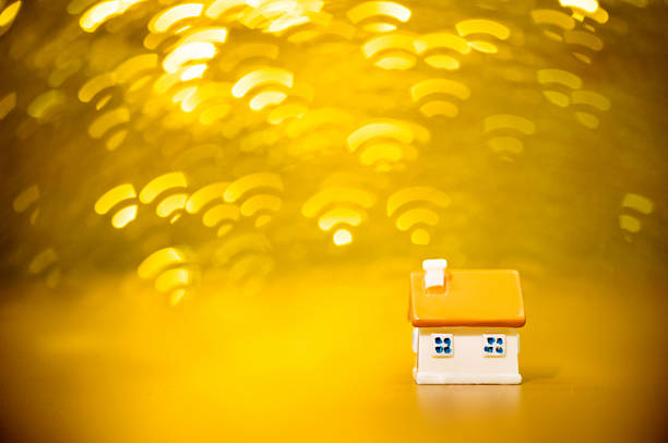 House model on Wi-Fi icon background.