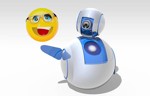 A funny smart robot that smiles and speaks a cute emoji held in his hand. / You can see the animation movie of this image from my iStock video portfolio. Video number: 1659242541