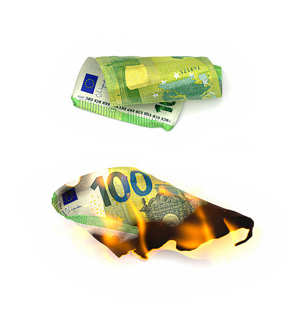 Crumpled, folded, and burned European currency isolated on white background top view