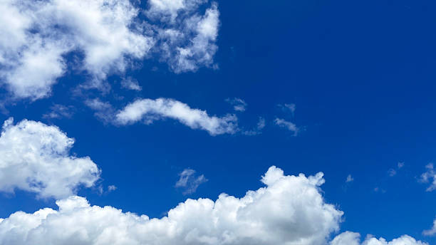 istock Clear blue sky and white clouds in the Okinawa sky 2241192712