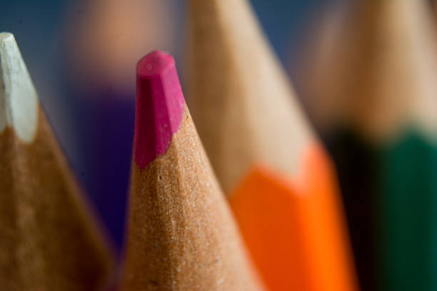 Sharpener next to a red colored pencil for drawing