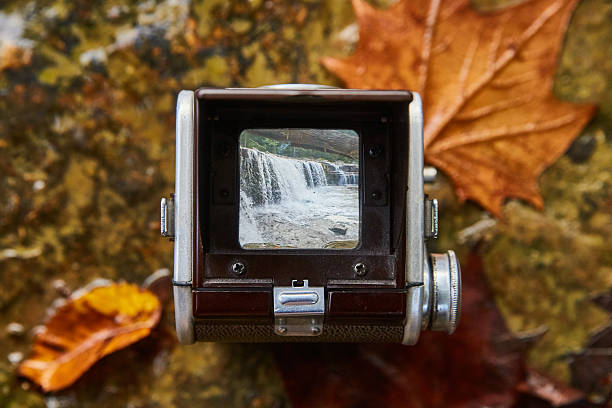 Vintage Twin-Lens Reflex Camera Capturing Autumnal Waterfall at Cataract Falls, Indiana, 2017