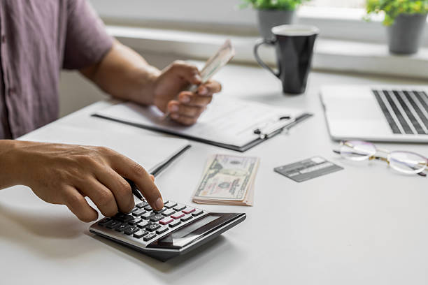 istock Male planning and checking for bills 2241204612