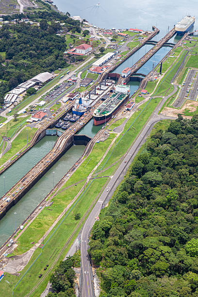 istock Neo-Panamax ships crossing third set of locks 2241206804