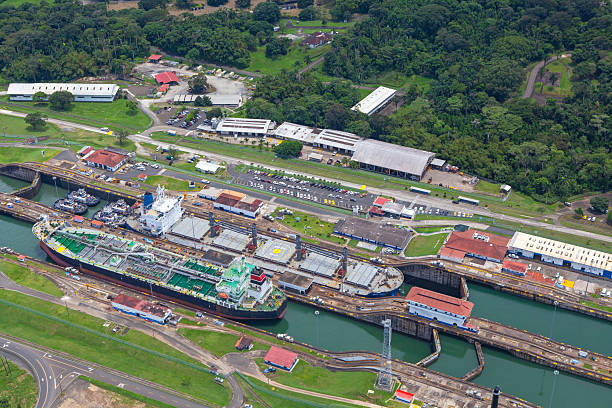 istock Neo-Panamax ships crossing third set of locks 2241206812