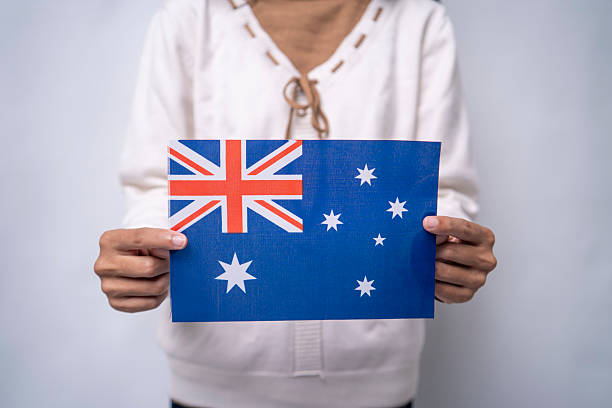 istock Person Holding a Small Australian Flag 2241212002