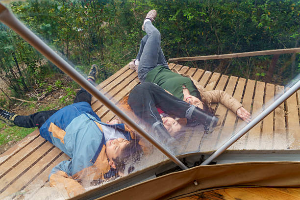 Family enjoying glamping camping in dome tent in southern chile
