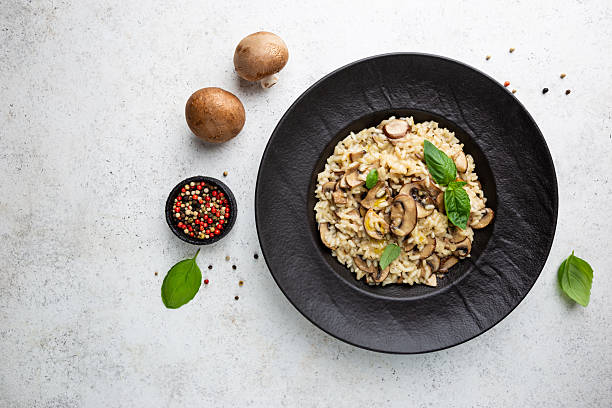 istock Risotto with mushrooms in a plate 2241219281