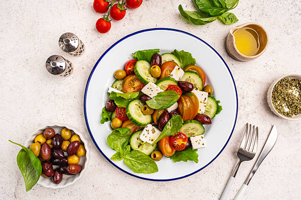 istock Greek salad with fresh vegetables 2241219636