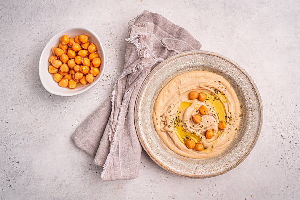 istock Various hummus dips, healthy and vegan snack 2241219670