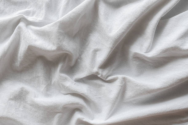 istock White Fabric with Wavy Folds 2241226336