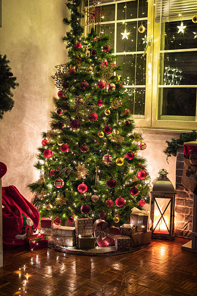 istock Christmas tree with presents in the living room 2241228760
