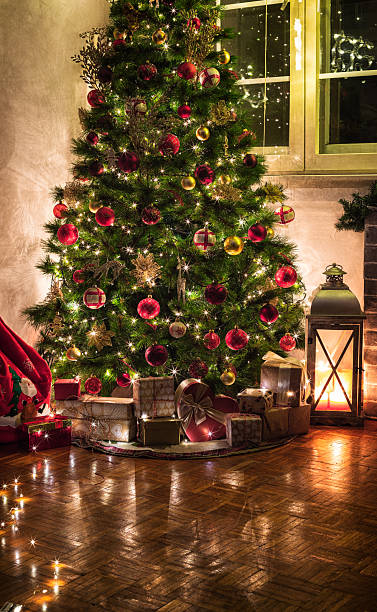 istock Christmas tree with presents in the living room 2241228765