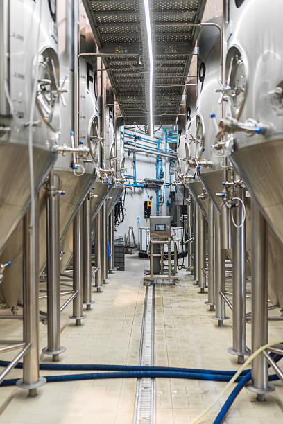 istock Brewing beer in shiny stainless steel fermentation tanks 2241228880
